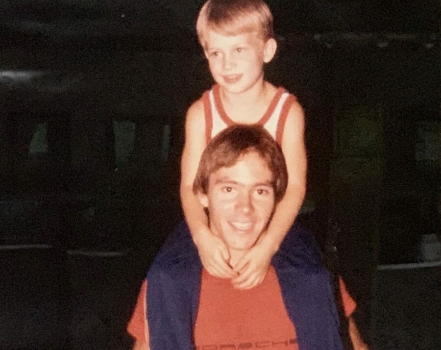 Young boy on the shoulders of a man