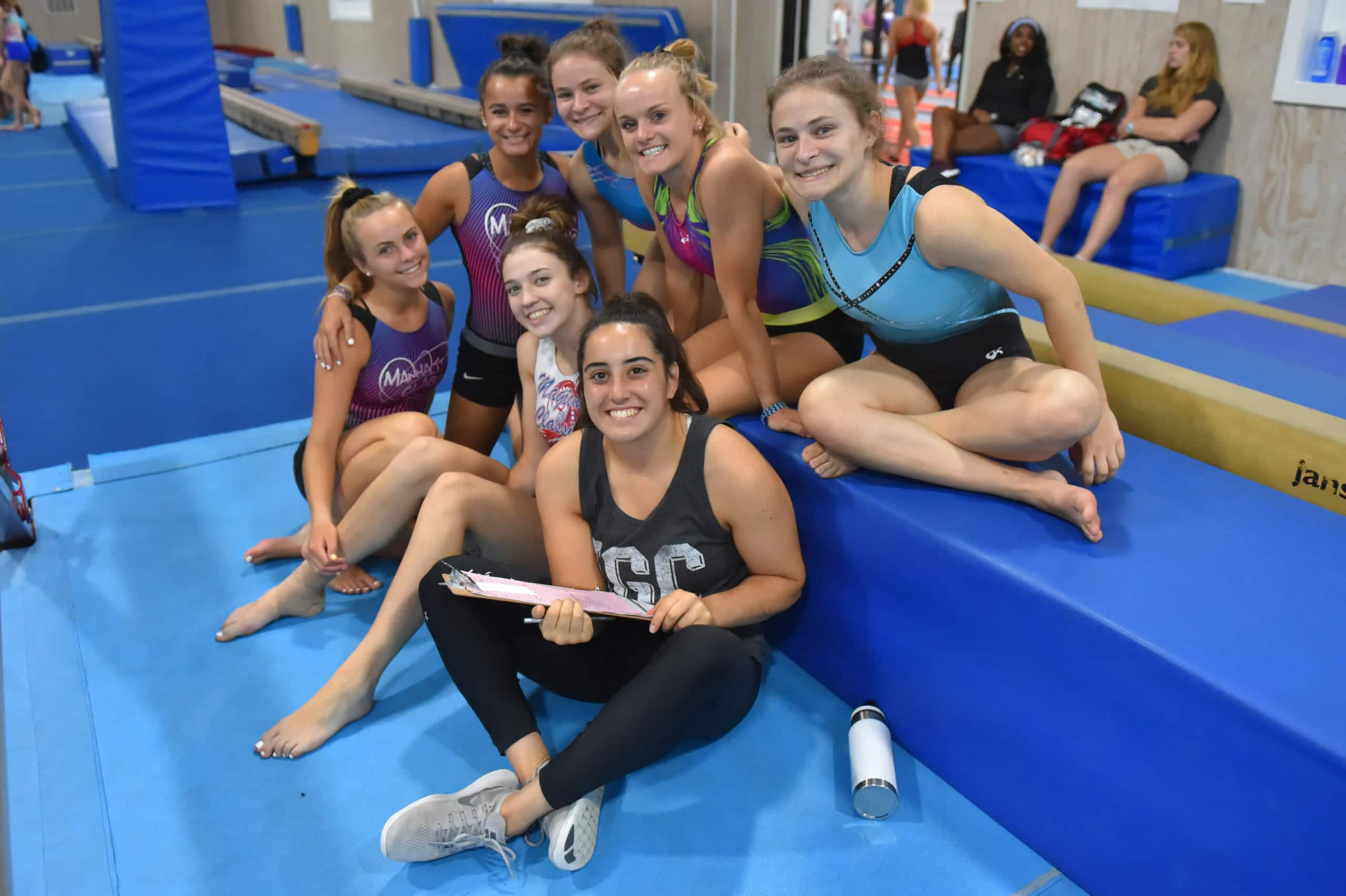 gymnastics coach and girls at IGC