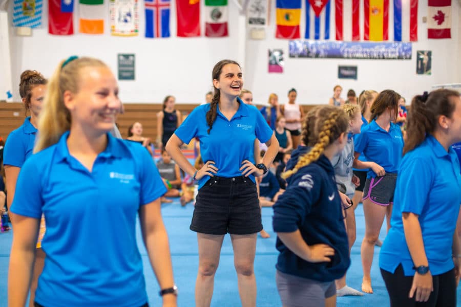 Staff members standing on mat in IGC facility