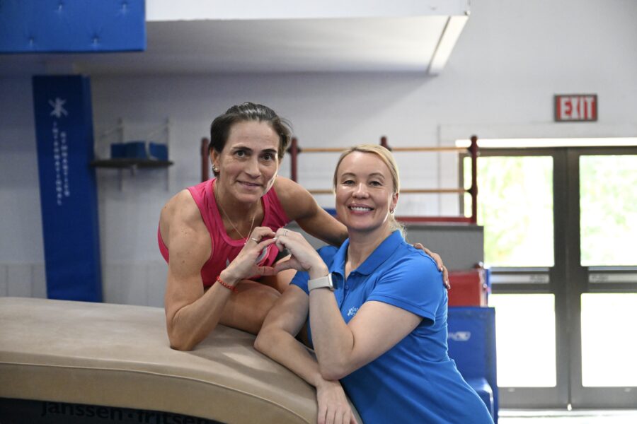 Oksana Chusovitina visits gymnastics camp.